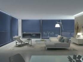 Cassette roller blind in soft blue blackout