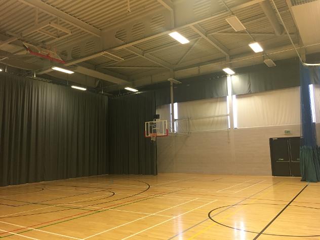 Abacus Technical Services sports hall curtain and pelmets in accolade by edmund bell
